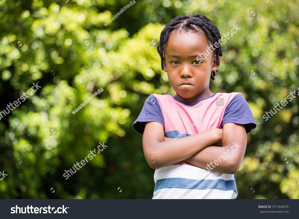 A child in a quiet, worried moment
